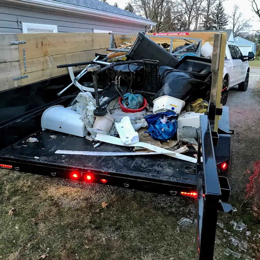 Roll-off dumpster delivered to a residential driveway in Dry Run
